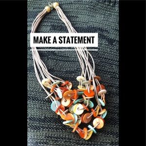 Make a statement with colorful statement necklace orange and earthtone colors!